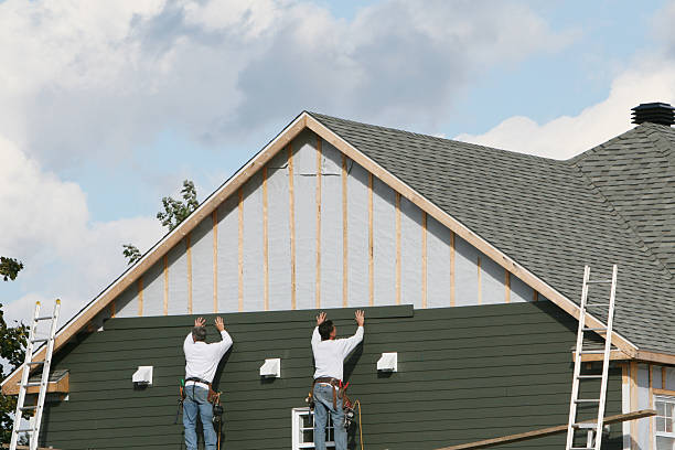 Professional Siding Replacement technician working in Chestnut Hill, MA